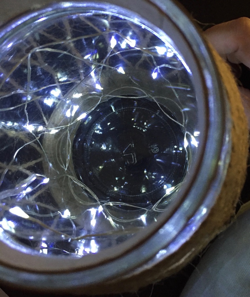 Overhead shot of the jar, showing the plastic instert with the lights on.